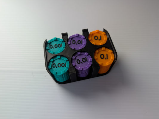 Boitier noir contenant des jetons de numération décimales : 0,001 turquoise, 0,01 violet et 0,1 orange